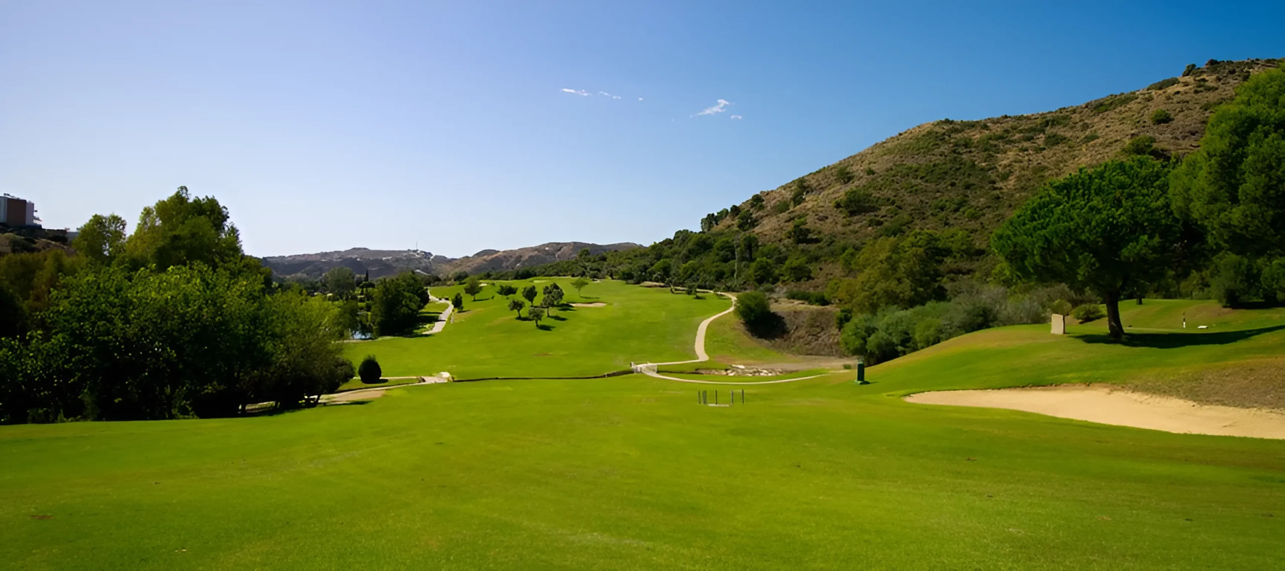 Los Arqueros Golf and Country Club in Benahavís with fairways and surrounding hillside views