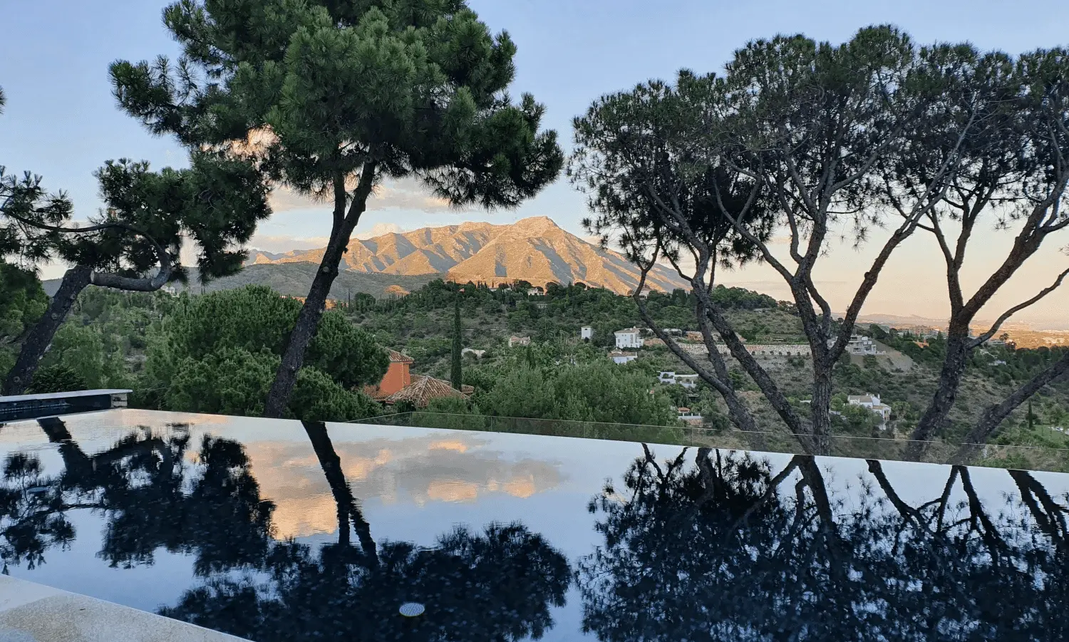 Looking over an infinity pool at la concha from a villa in Benahavis