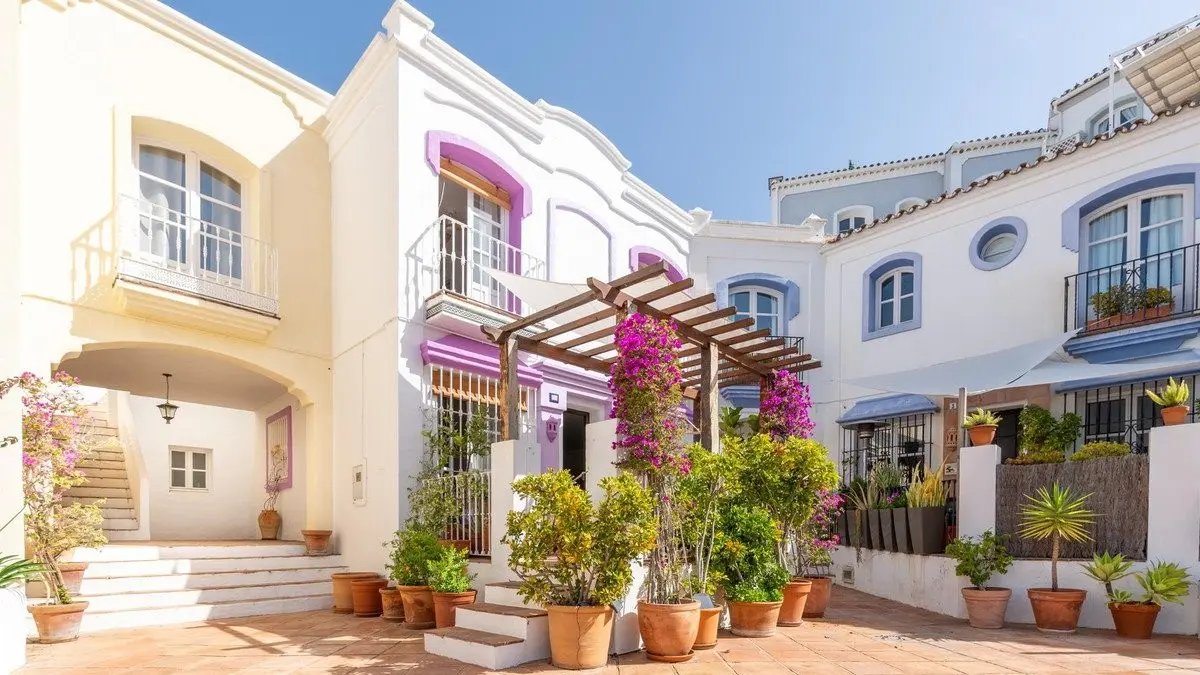 Colourful Andalusian-style homes in La Heredia hillside community