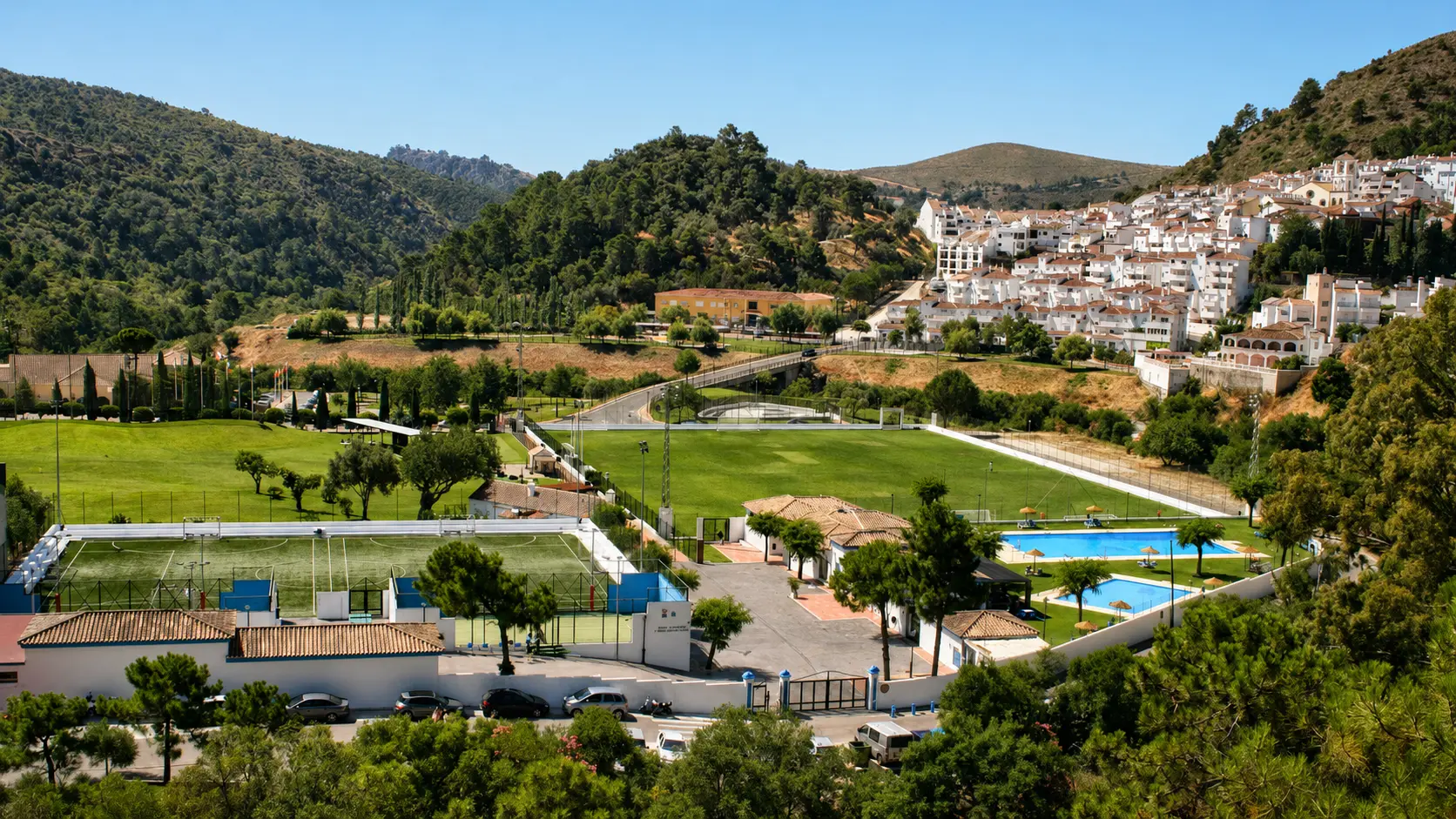 Municipal sports facilities in Benahavís with the white village and mountains beyond